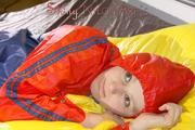 Lucy wearing a sexy shiny nylon shorts and two rain jackets feeling breath control (Pics)