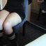 American Domme Shackled To The Chair