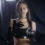 Beauty girl Smoking wearing Latex gloves and top