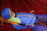 Sexy Sonja being tied and gagged with ropes and a clothgag hanging wearing a sexy rainwear combination (Pics)