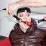 Jill tied and gagged in a shiny nylon downcoat