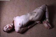 Amanda hogtied nude on floor