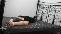 Laura lying on bed 1/2