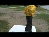 Being with Enni sitting at a lake wearing sexy shiny nylon rainwear (Video)