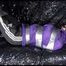 SANDRA tied and gagged with tape on a sofa wearing a sexy black shiny nylon pants and a purple rain jacket (Video)