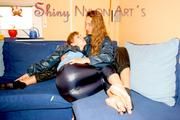 Stella and Leonie having fun with eachother wearing sexy shiny nylon rainwear (Pics)