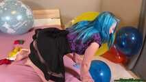 nail2pop big balloons on bed