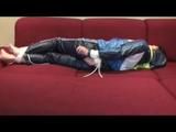 03:10 Min. video with Isabelle tied and gagged in shiny nylon clothes