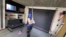 Lana bound and gagged in a shiny nylon Downvest