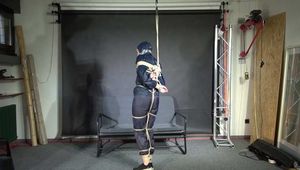 Rachel Adams bound and pantygagged in shiny nylon Rainwear