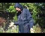 Mara wearing only a hot rain jacket and rubber boots lingering in the garden taking a shower (Video)