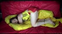 SEXY MARA ties and gagges herself with cuffs and a ball gag wearing a sexy red/yellow shiny nylon shorts and a sexy yellow top (Video)