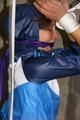 Alina tied and gagged in shiny nylon clothes