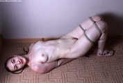 Amanda hogtied nude on floor