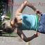 Sonja wearing a sexy jeans shorts over her green shiny nylon shorts while walking through the street lateron she takes the jeans off (Pics)