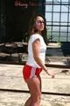 Stella posing outdoor wearing a supersexy red shiny nylon shorts and a white top (Pics)