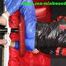 Sexy PIA wearing a sexy blue rainbib and a black/red shiny nylon rainjacket being tied, gagged and hooded on a chair with ropes and a ballgag (Pics)