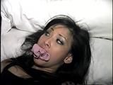 30 YR OLD ASIAN LI-JUN IS MOUTH STUFFED, HANDGAGGED & TRYING TO CALL FOR HELP ON PHONE WITH HER HANDS TIED (D64-16)