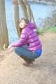 Alina during her walk on the sea wearing sexy shiny nylon down jacket and a shiny nylon shorts under her jeans (Pics)