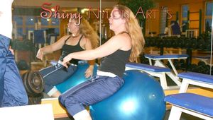 Stella and Leonie in a fitness studio wearing supersexy rainwear (Pics)