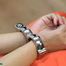 Strong hogcuffed with chains