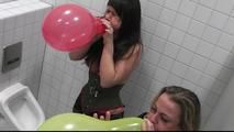 Two girls at the mens toilet