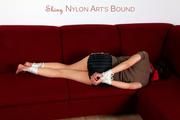Nicole tied and gagged in black shorts