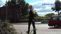069017 Tiffany Pees Behind A Parked Trailer