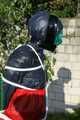 Watch Sandra bound, gagged and pantyhooded in her shiny nylon Rainwear