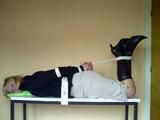 Hogtied on the table