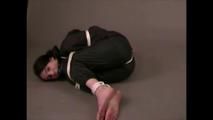 4 short videos in one of an beautiful black haired archive girl tied and gagged on the floor wearing sexy shiny nylon rainwear (Video)