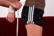 Nicole tied and gagged in black shorts