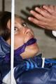 Alina tied and gagged in shiny nylon clothes