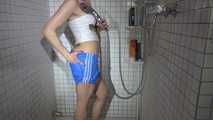 SEXY SANDRA in the shower with a sexy lightblue shiny nylon shorts and a top (Video)