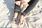 Sitting unable to move in the sand