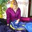 Pia tidies up the cupboard wearing supersexy purple shiny nylon rainwear (Pics)