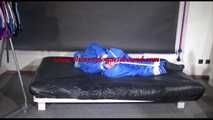 Lucy tied and gagged with ropes on bed wearing sexy blue oldschool downwear (Video)