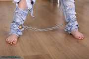 Cowgirl in high security handcuffs