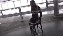 Stella on chair at car park 2/2