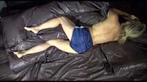Sexy SANDRA wearing ONLY a sexy shiny nylon shorts posing and lolling in a shiny nylon cloth on a bed (Video)