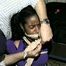 BLACK STUDENT, BALL-GAGGED, BALL-TIED, ACE BANDAGE & CLEAVE GAGGED & HOG-TIED  (D32-6)