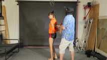 Lana bound and gagged in shiny Shorts and Windbreaker 