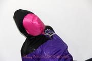 Katharina tied and gagged in rainwear with breath control