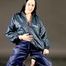 Dark angel posing in a studio wearing sexy black shiny nylon rainwear (Pics)