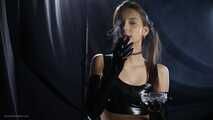 Beauty girl Smoking wearing Latex gloves and top