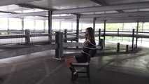 Stella on chair at car park 2/2