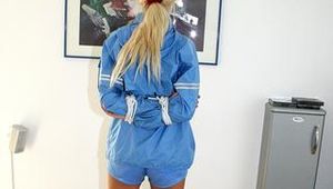 One of our archive girls bound and gagged in shiny nylon shorts