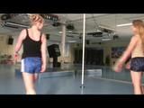 Katharina and Jenny during their pole training in the fitness studio wearing sexy shiny nylon shorts and tops (Video)