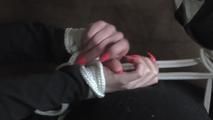 Angi hogtied on couch 2/2