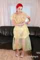 Morrigan - posing in yellow trash bag dress